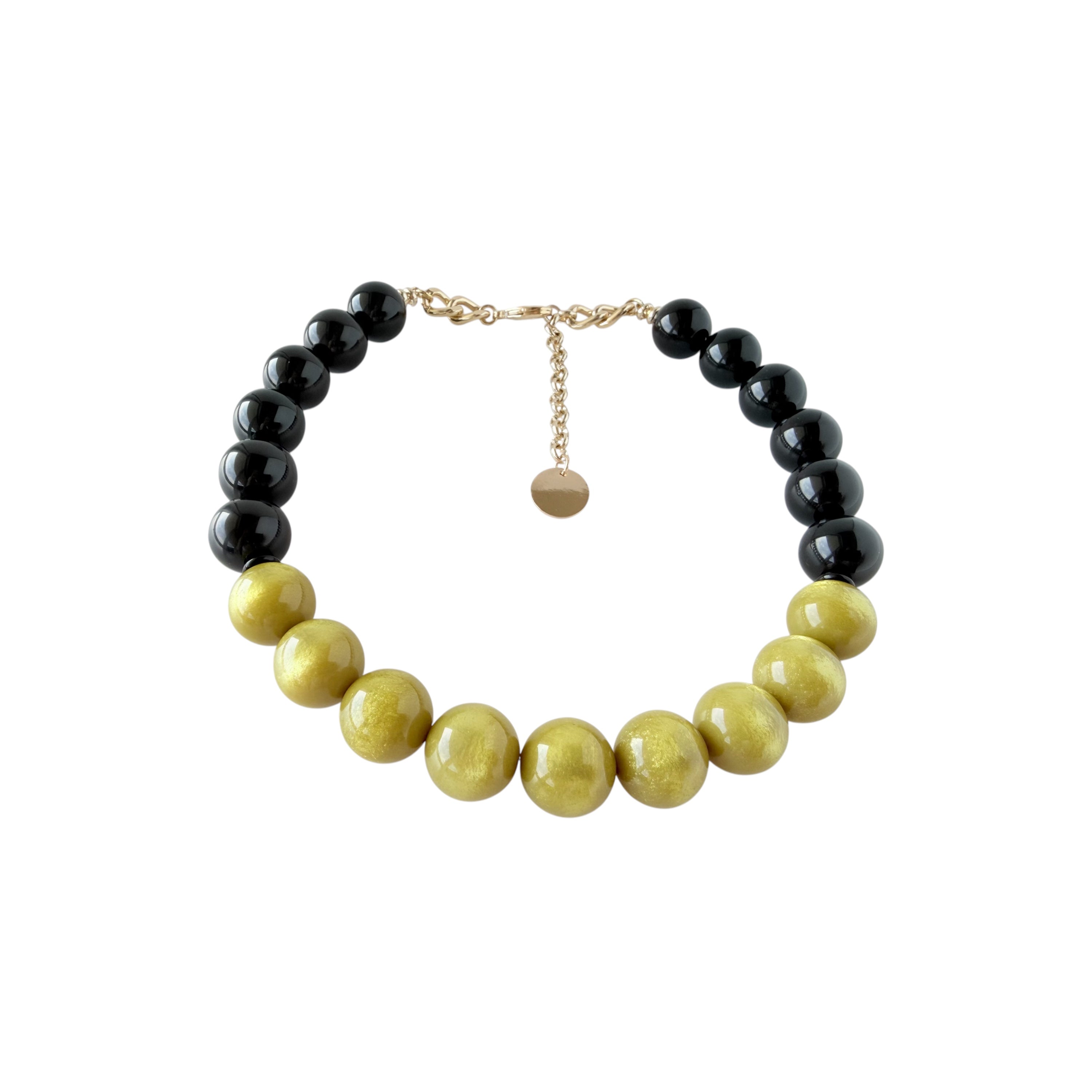 Handmade yellow mustard and black Italian resin statement necklace by Tessa Bijoux with glossy 18 mm beads.