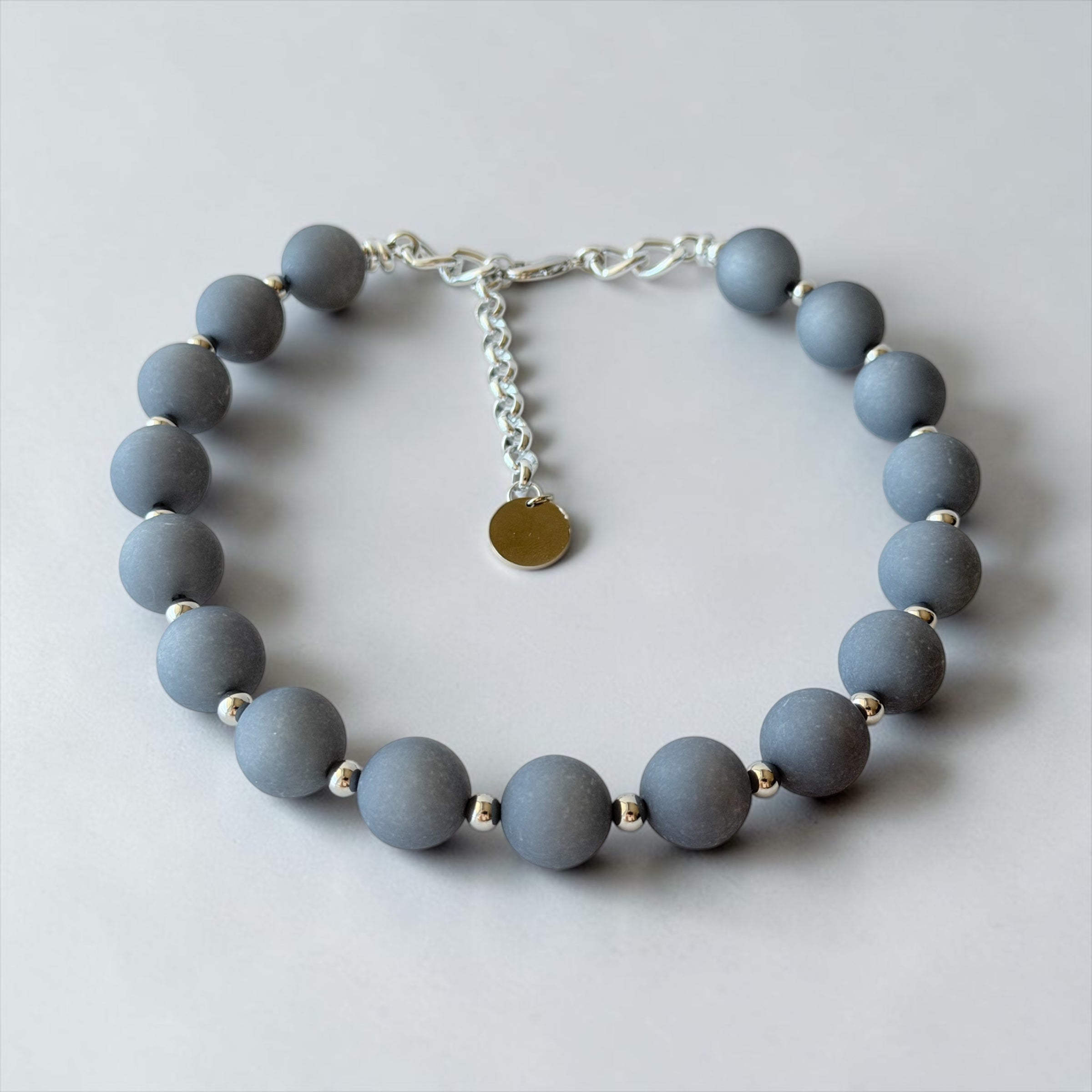THE SEVENTY COLLECTION- 18 MM BLUE GRAY MATTE STATEMENT NECKLACE BY TESSA BIJOUX